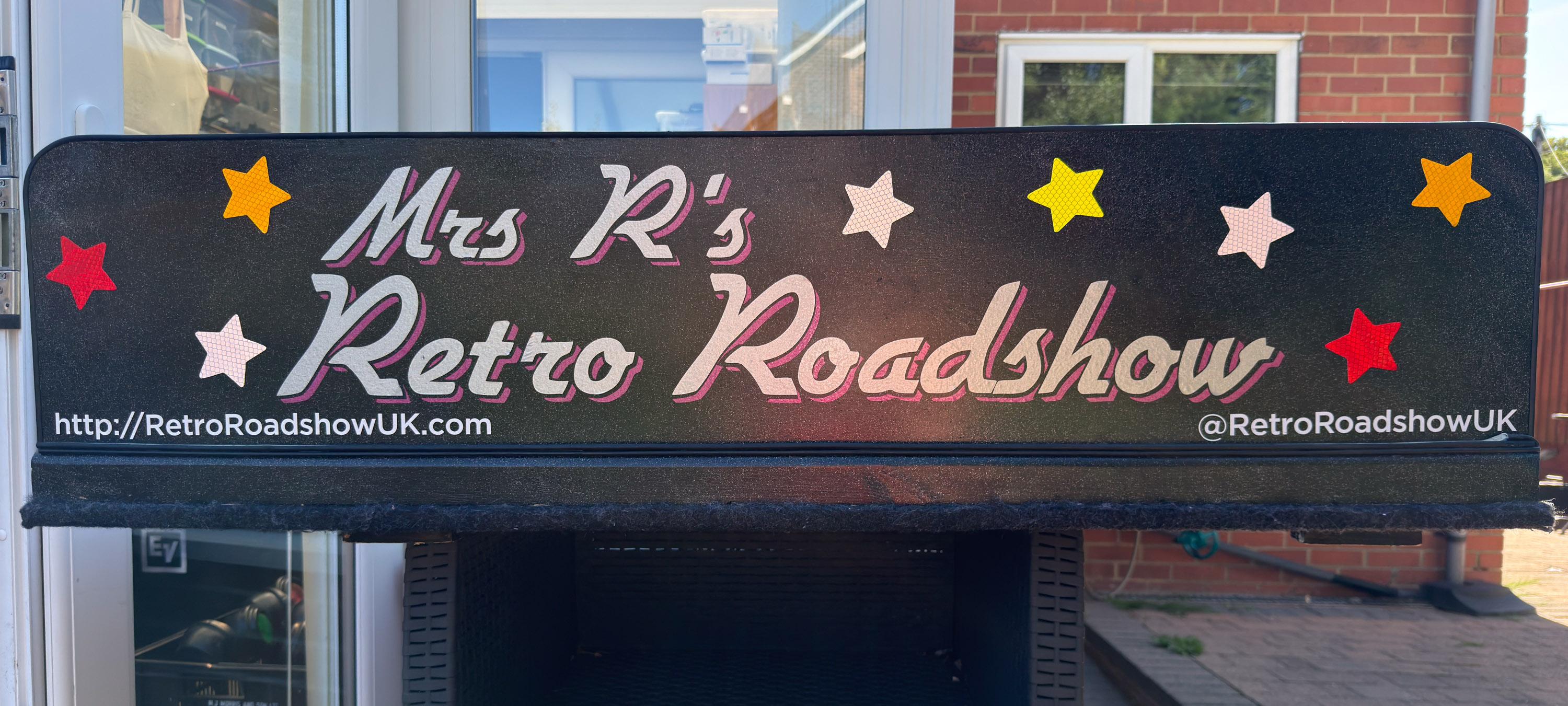 A front fascia for a mobile disco reading "Mrs R's Retro Roadshow", measuring approx 1200mm x 300mm.